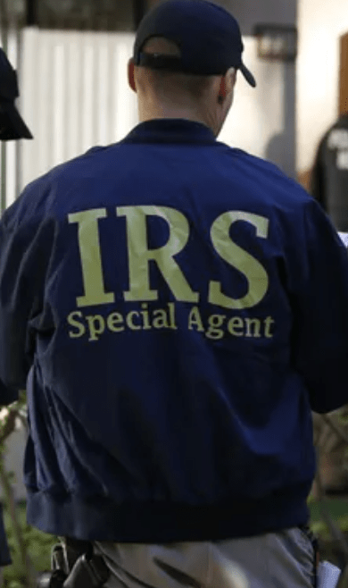 Irs revenue officer. Not all revenue officers are armed with a gun. Do not threaten a revenue officer.